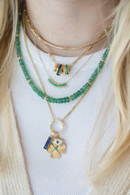 14K Gold Puffy Oval Baguette Sapphire Spacer