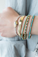 14K Gold Alternating Round Emerald Diamond Tennis Bracelet