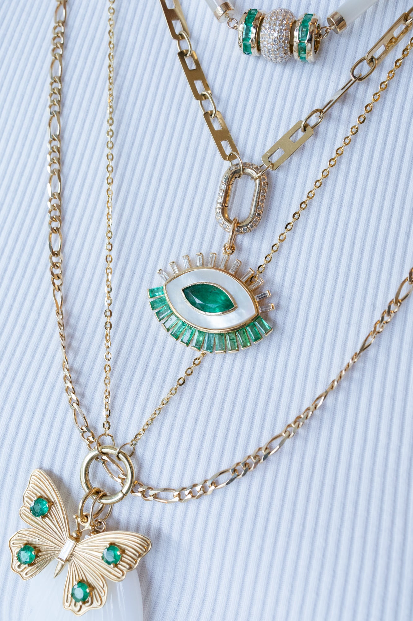 14K Gold Mother of Pearl Baguette Emerald Evil Eye Charm
